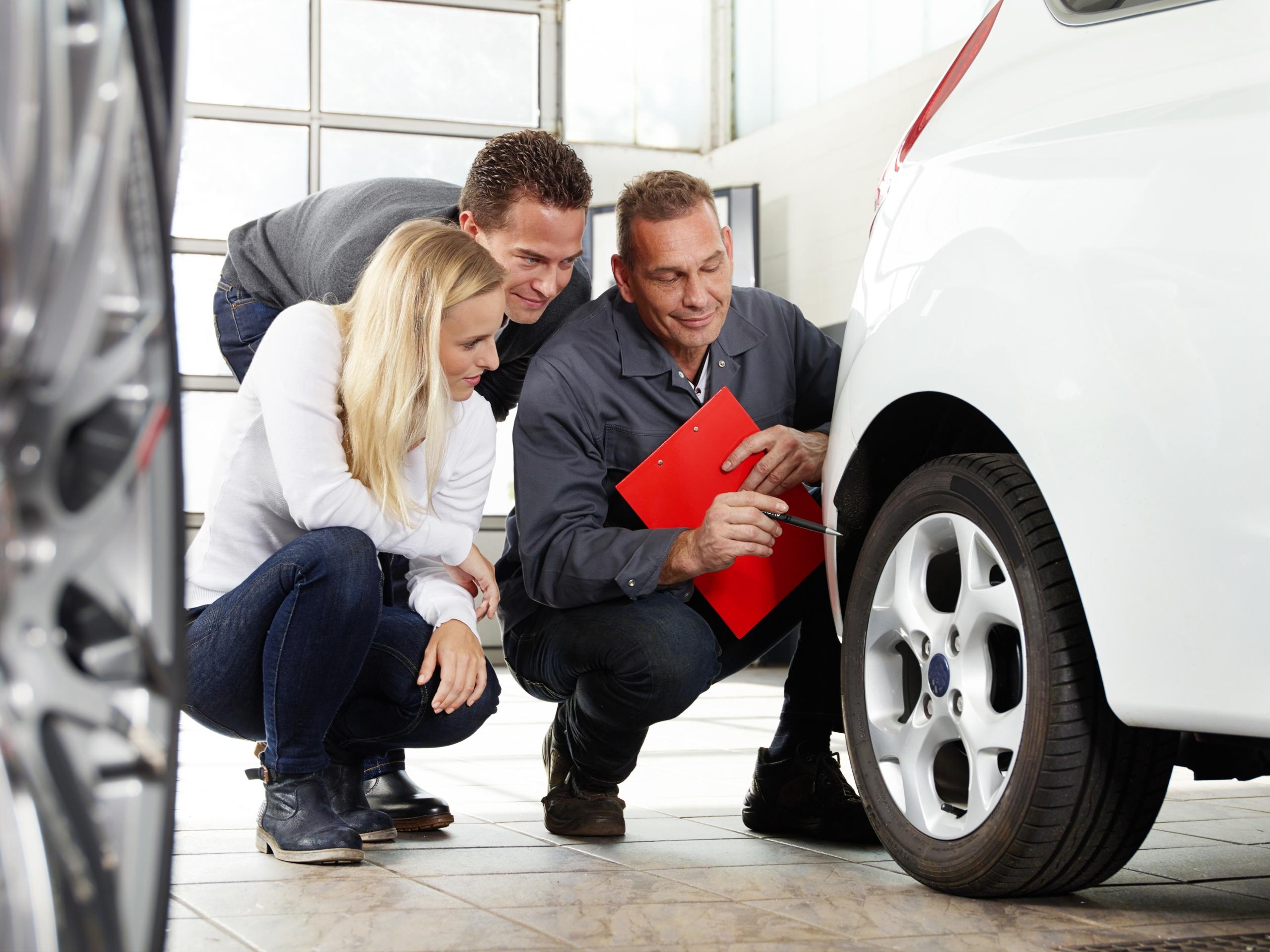 Mechanic with customers